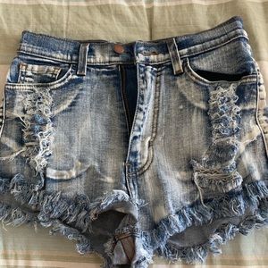 Distressed denim shorts